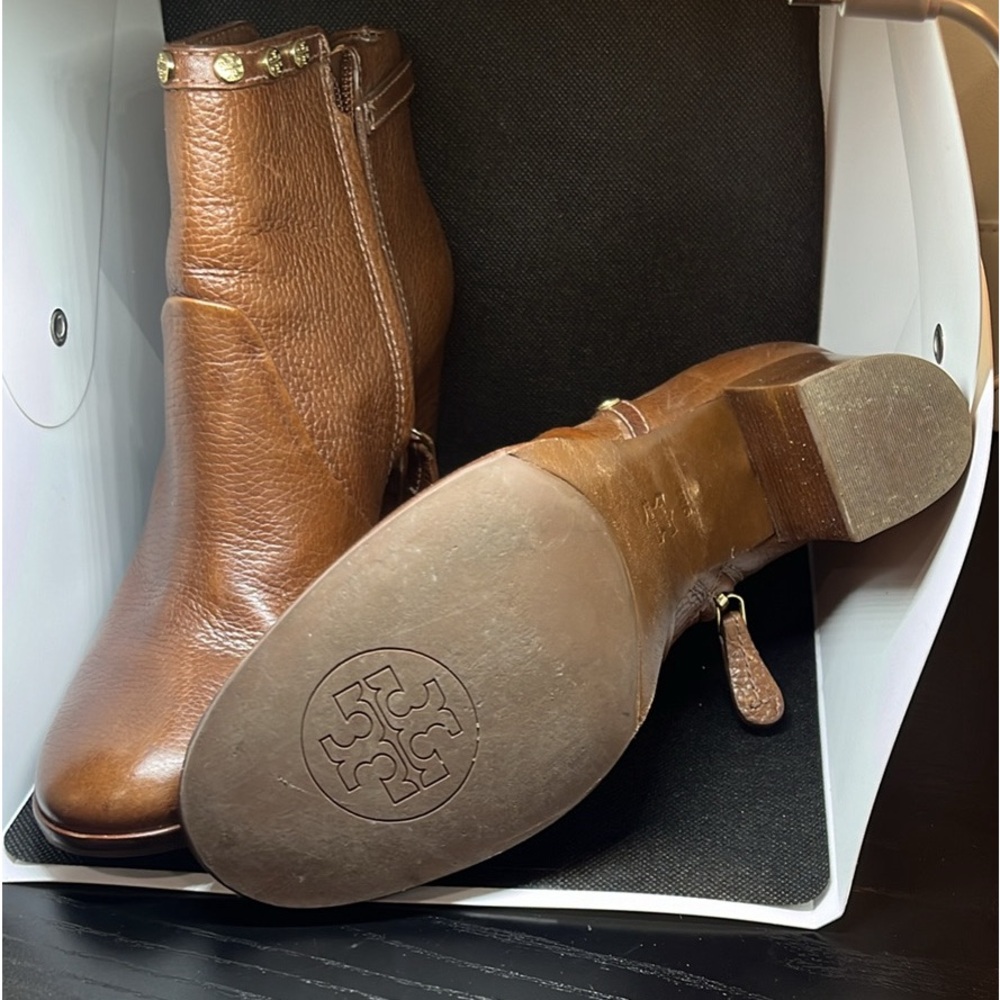 Genuine leather Tory Burch with gold accents.